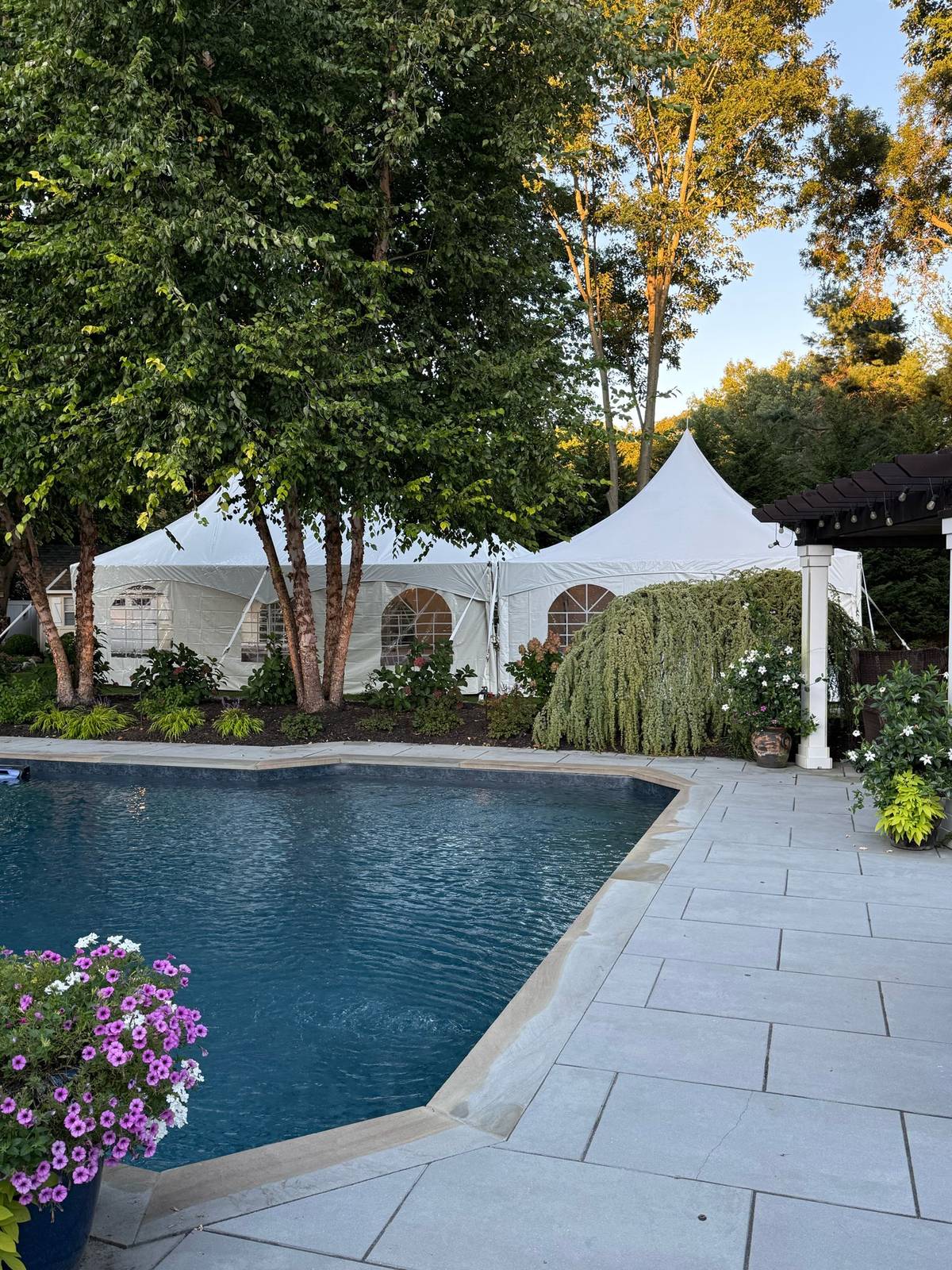 High peak party tent with tables and chairs set up by ParTee Pros Tent & Party Rentals